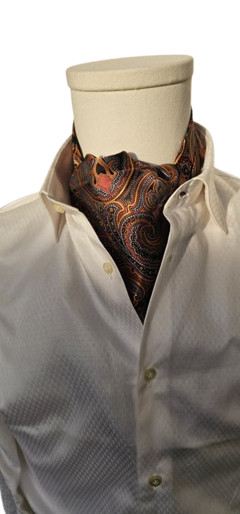White dress shirt with a patterned cravat on a mannequin against a white background