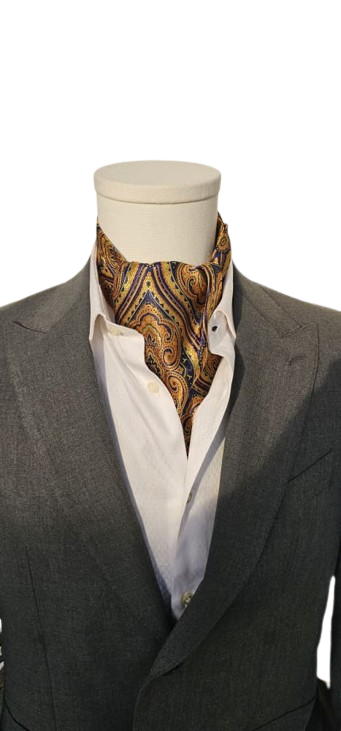 Mannequin wearing a gray suit with a white shirt and patterned ascot tie on a white background