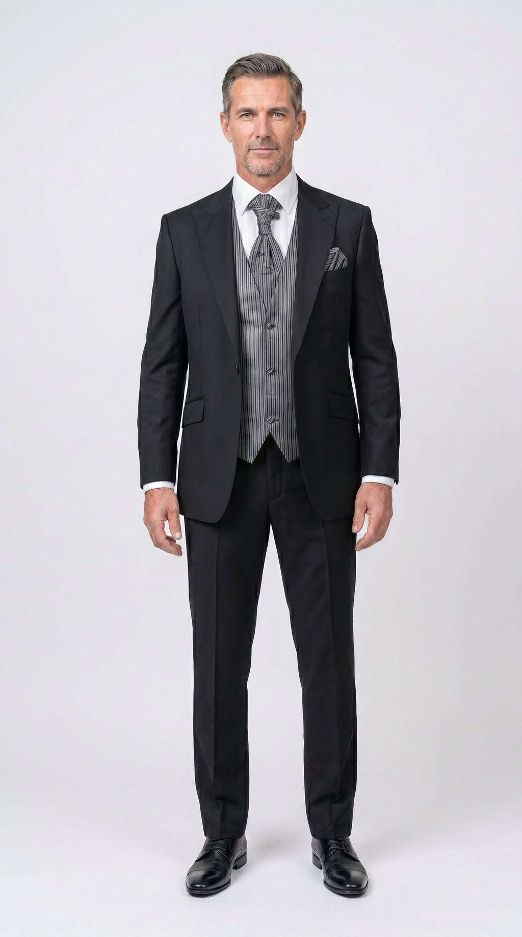 Man wearing a Grey Striped Vest with a Suit