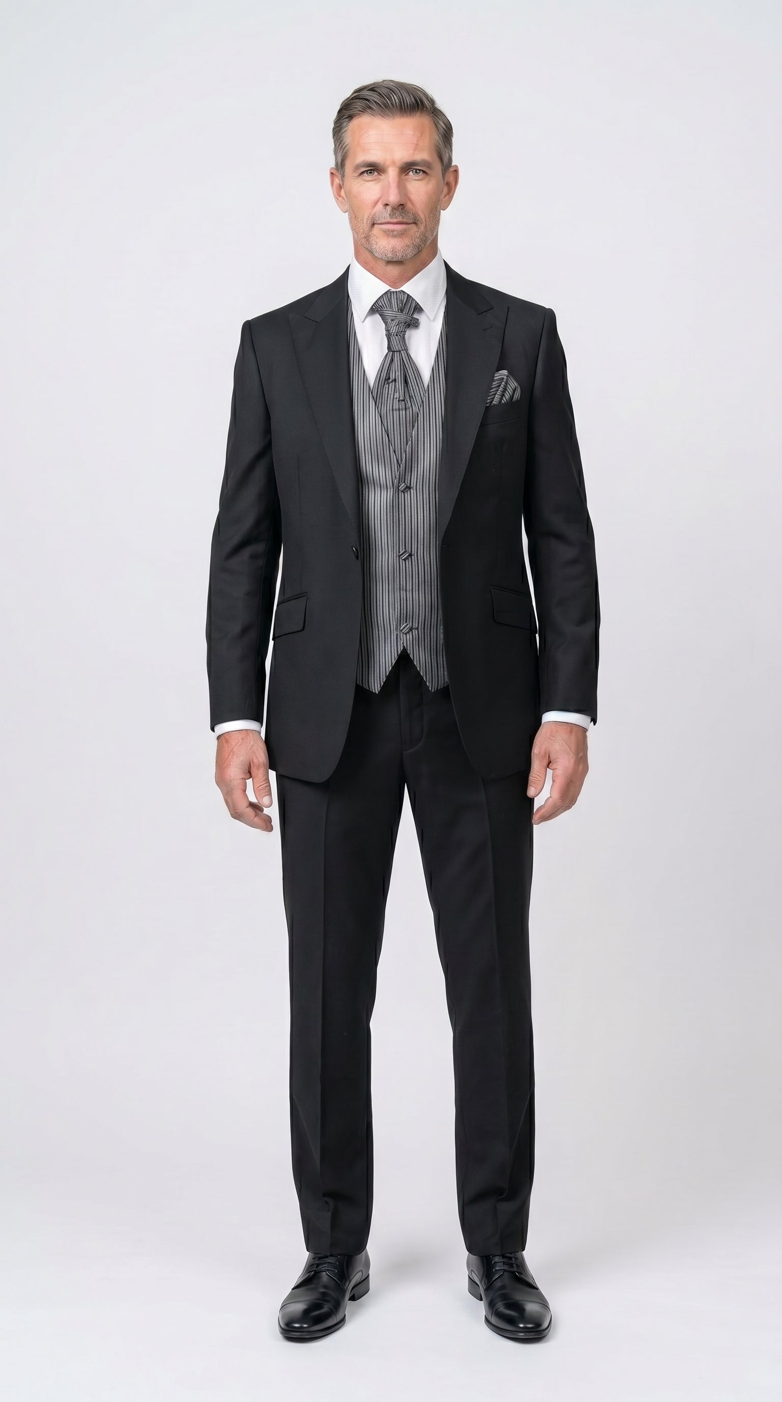 Man wearing a Grey Striped Vest with a Suit