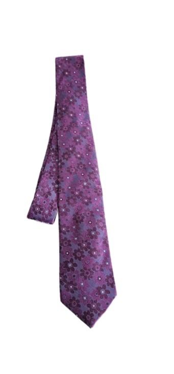 Purple tie with floral pattern on a white background