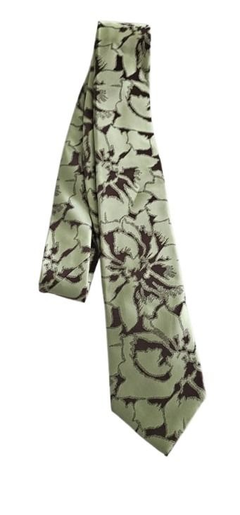 Green floral patterned tie on a white background